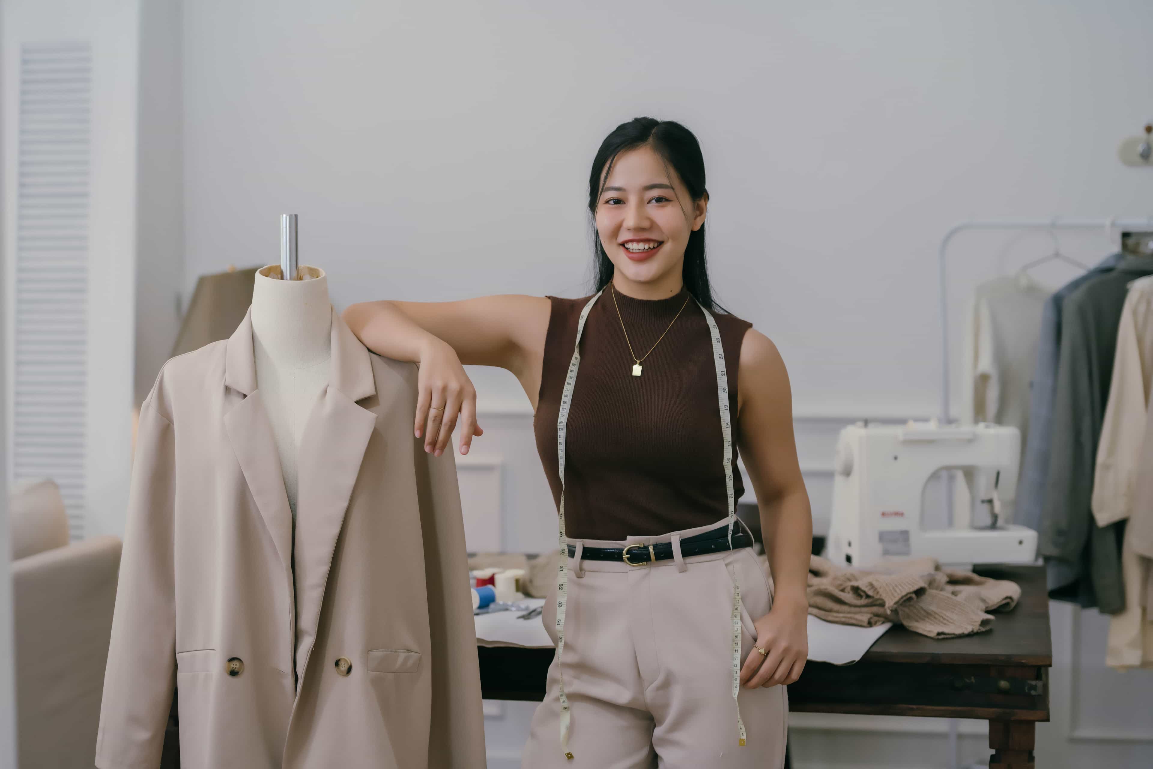 Fashion entrepreneurs with their clothing brand products
